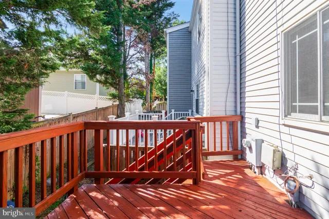 a view of outdoor space with deck and furniture