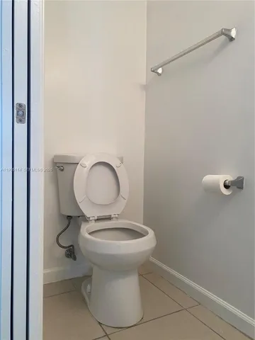 a kitchen with a sink cabinets and window