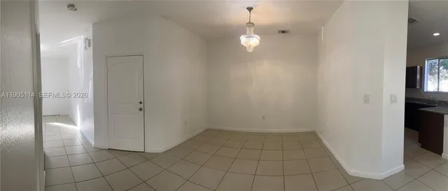 a view of a washer and dryer in a room
