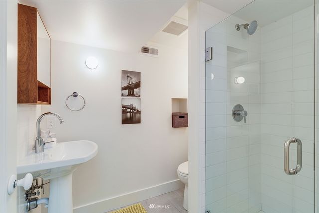 a view of a chairs and table in the house