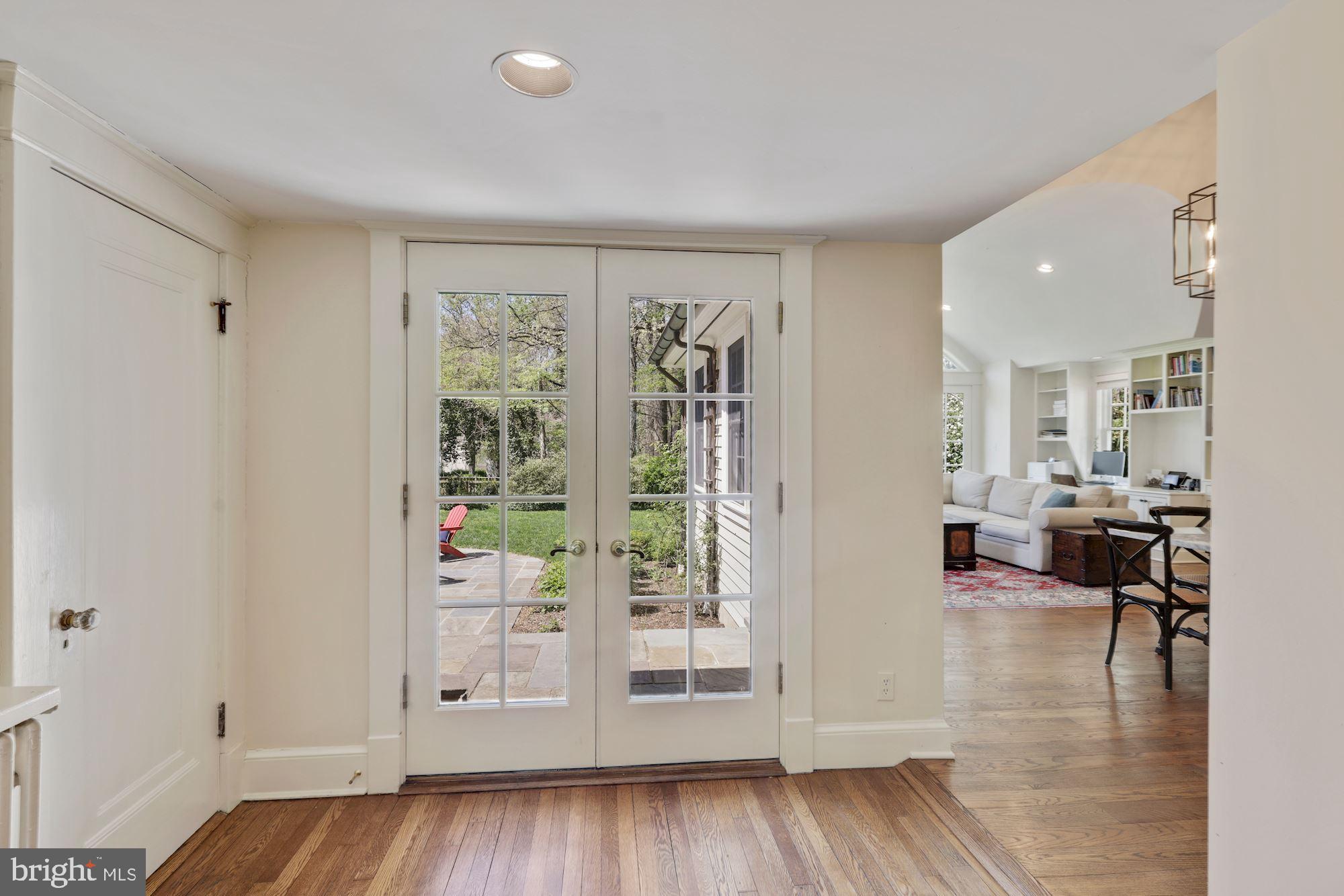 5804 Cedar Parkway Chevy Chase, MD 20815 - Photo 11 of 77 Doors at End of Hallway to Rear Yard