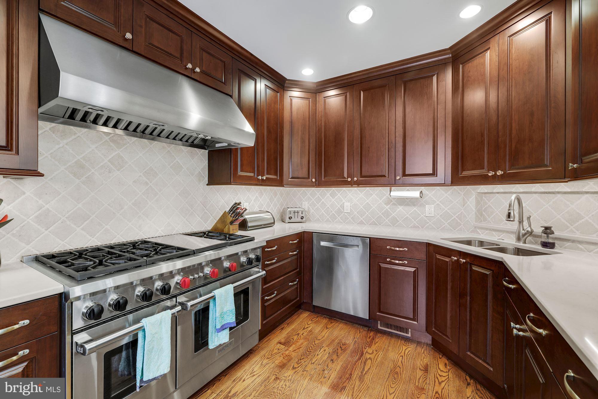 5804 Cedar Parkway Chevy Chase, MD 20815 - Photo 20 of 77 Abundance of Cabinets, Light and Work Surfaces