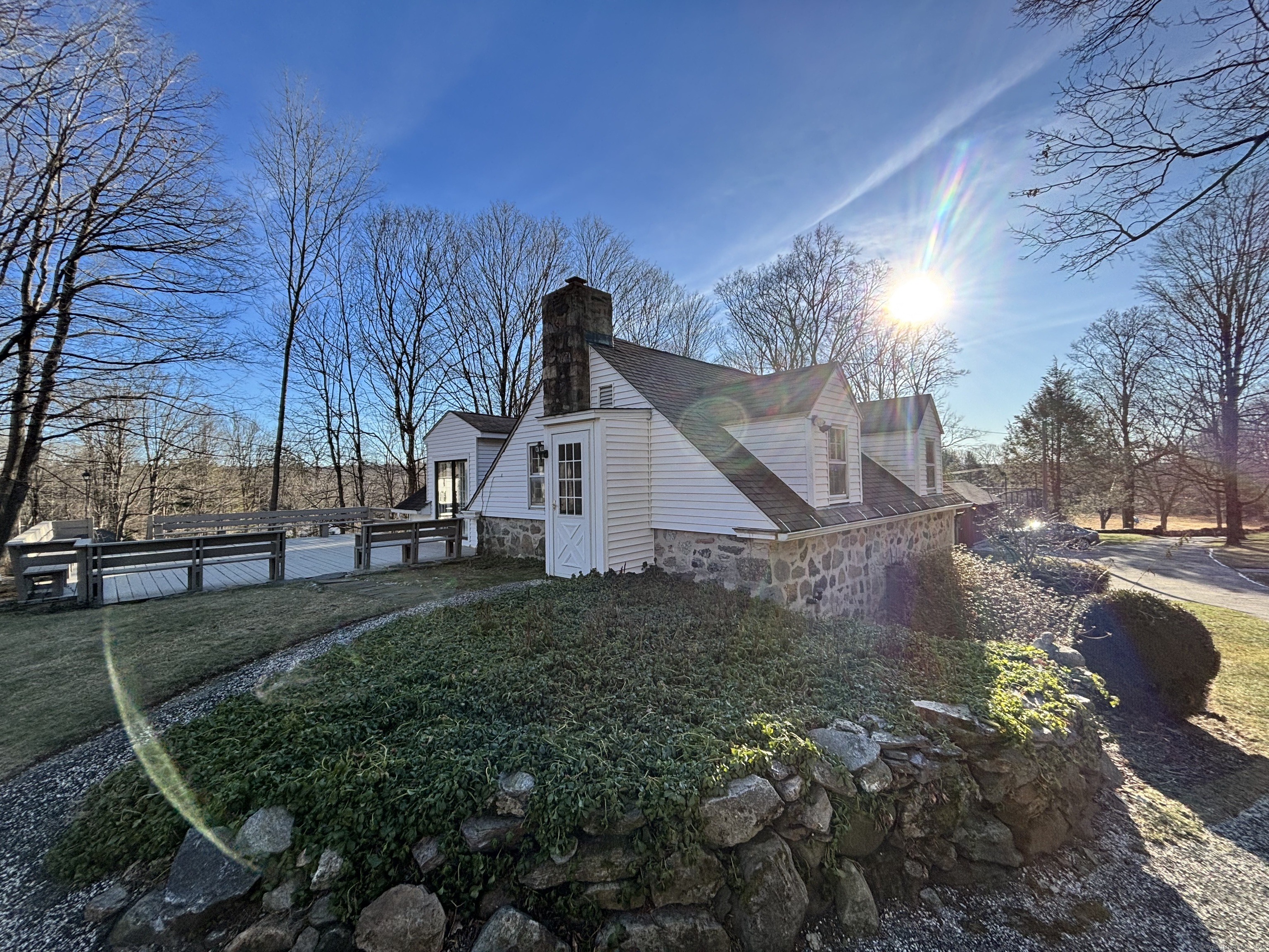 65 B Cross Highway Redding, CT 06896 - Photo 1 of 25 a view of a house with a yard