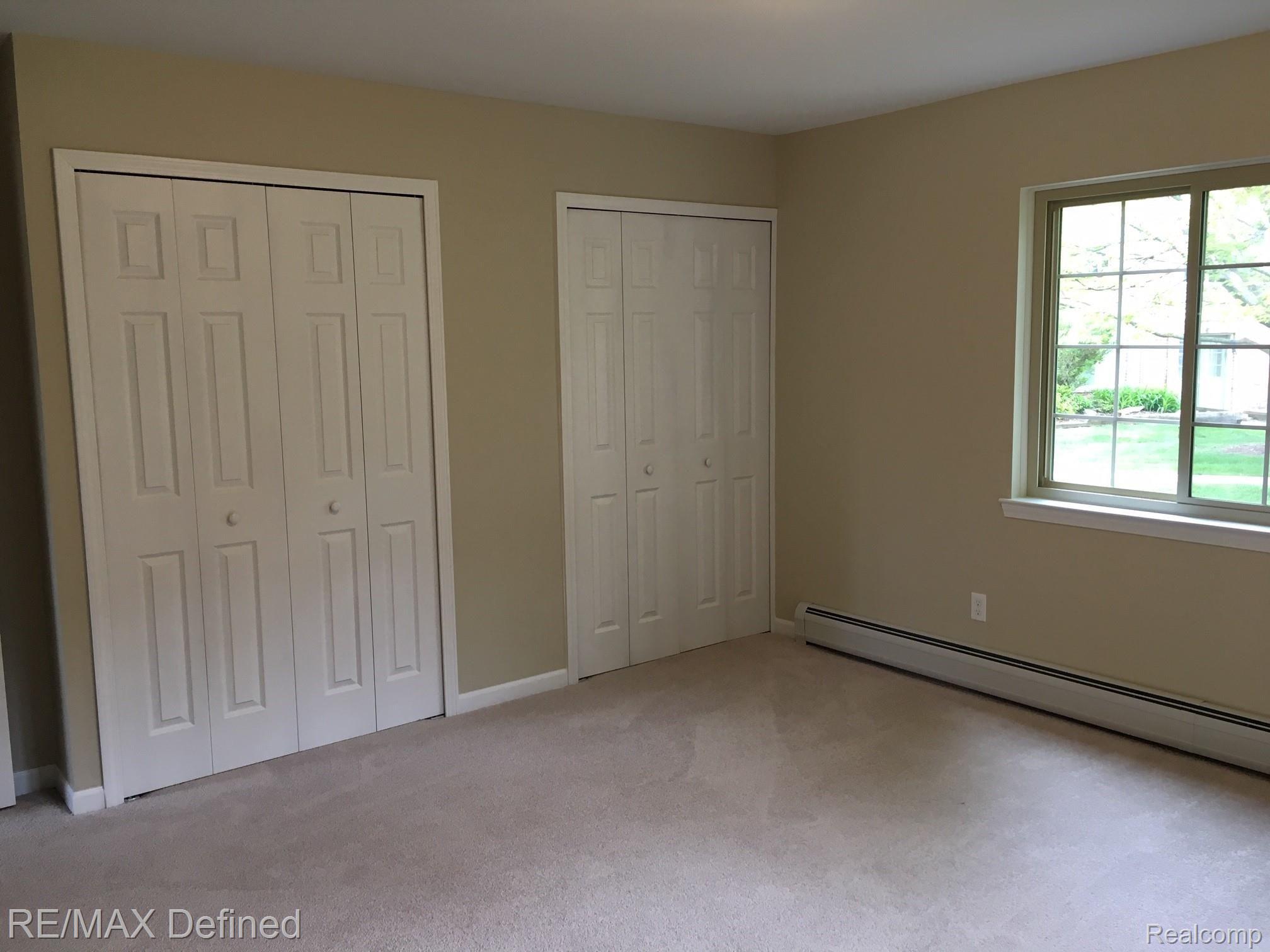 454 Romeo Road, Unit 22 Rochester, MI 48307 - Photo 16 of 18 ROMEO RD MASTER 2.jpeg