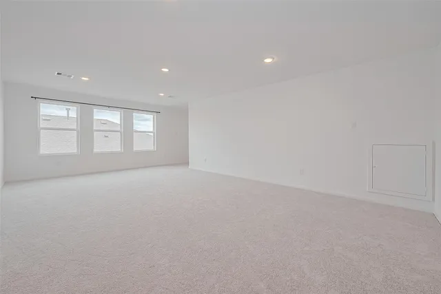 an empty room with an entryway