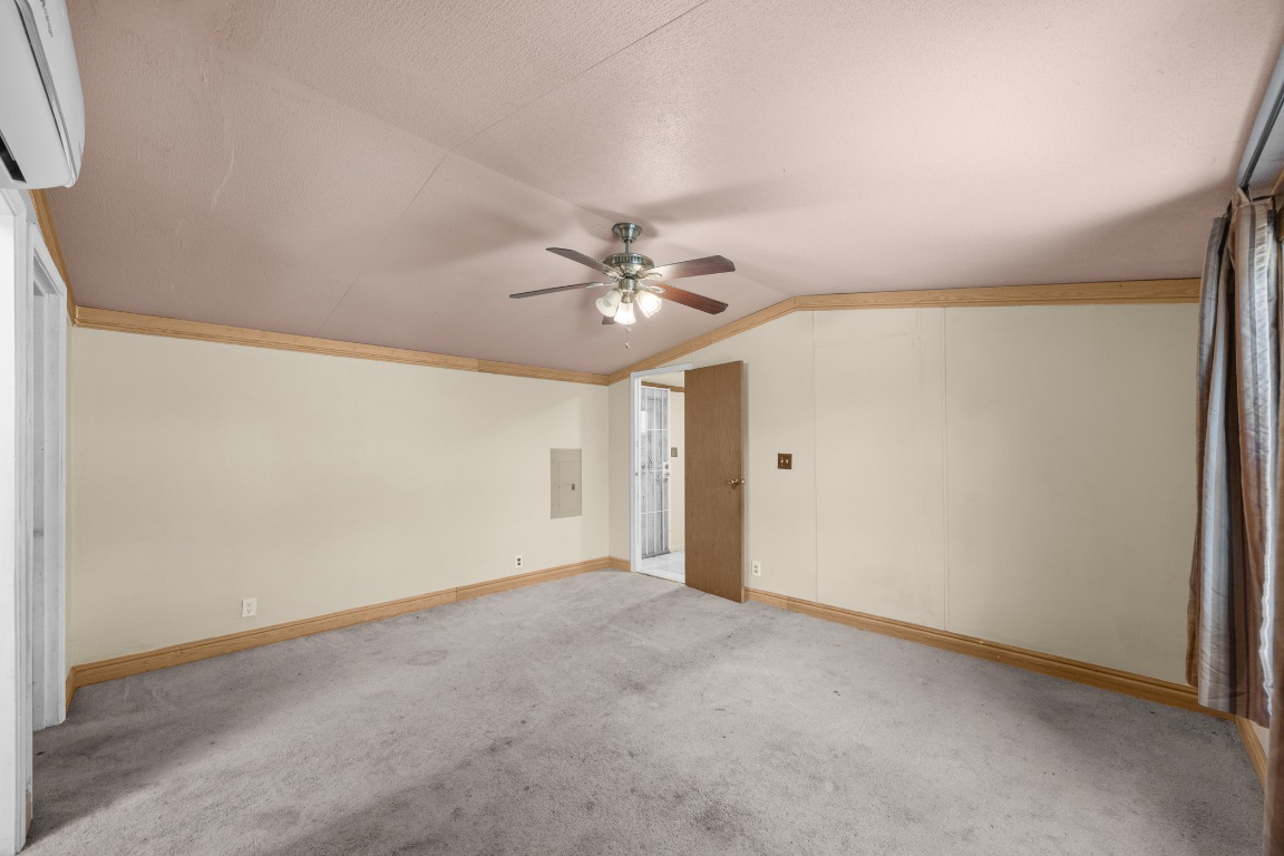 147 Community Center Road Rosanky, TX 78953 - Photo 14 of 33 a view of a livingroom with a ceiling fan and window