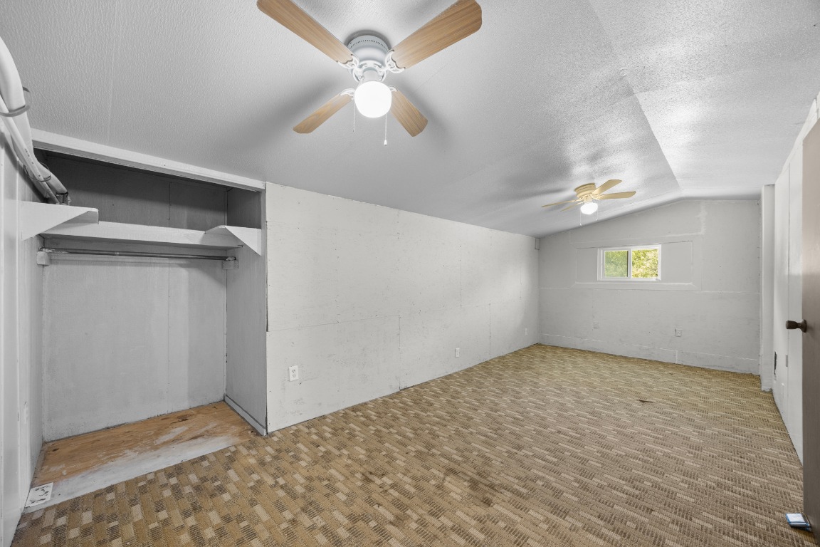 147 Community Center Road Rosanky, TX 78953 - Photo 17 of 33 a view of an empty room with a window