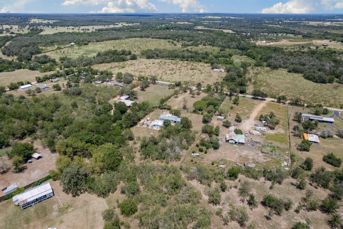 147 Community Center Road Rosanky, TX 78953 - Photo 32 of 33 an aerial view of a house with a yard