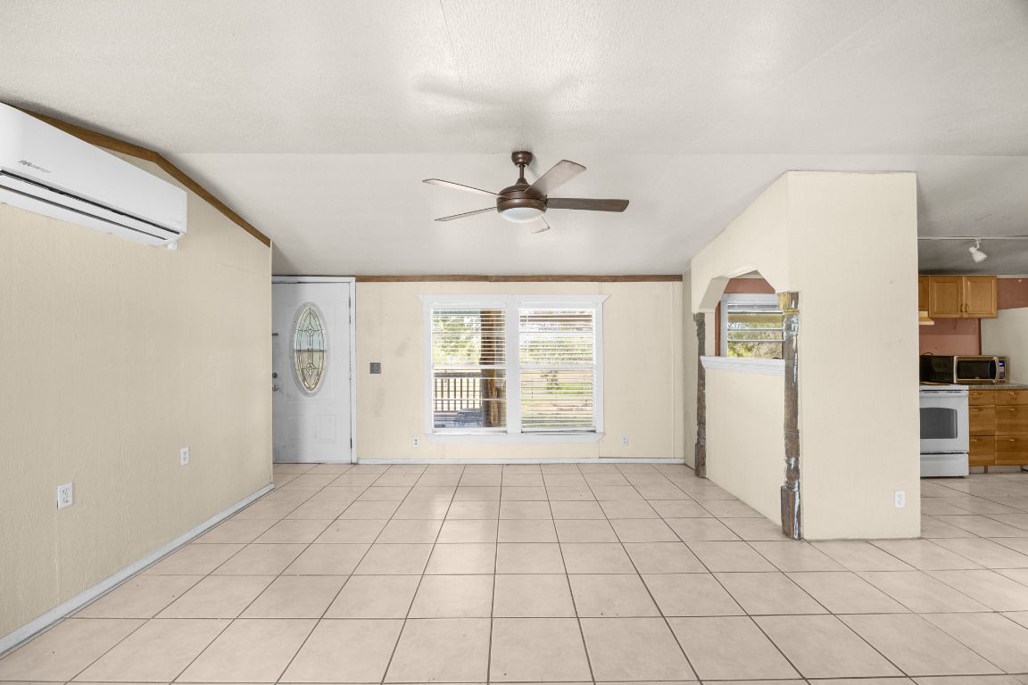 147 Community Center Road Rosanky, TX 78953 - Photo 7 of 33 a view of an empty room with a window