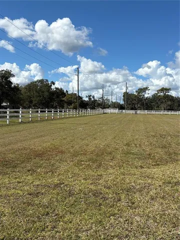 a view of a water with an ocean beach