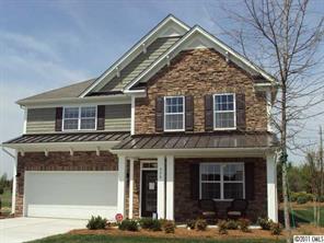 233 Lorraine Road Fort Mill, SC 29708 - Photo 1 of 16 a view of a house with large windows