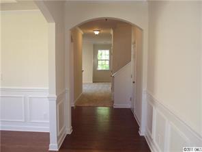 233 Lorraine Road Fort Mill, SC 29708 - Photo 3 of 16 a view of a hallway with wooden floor