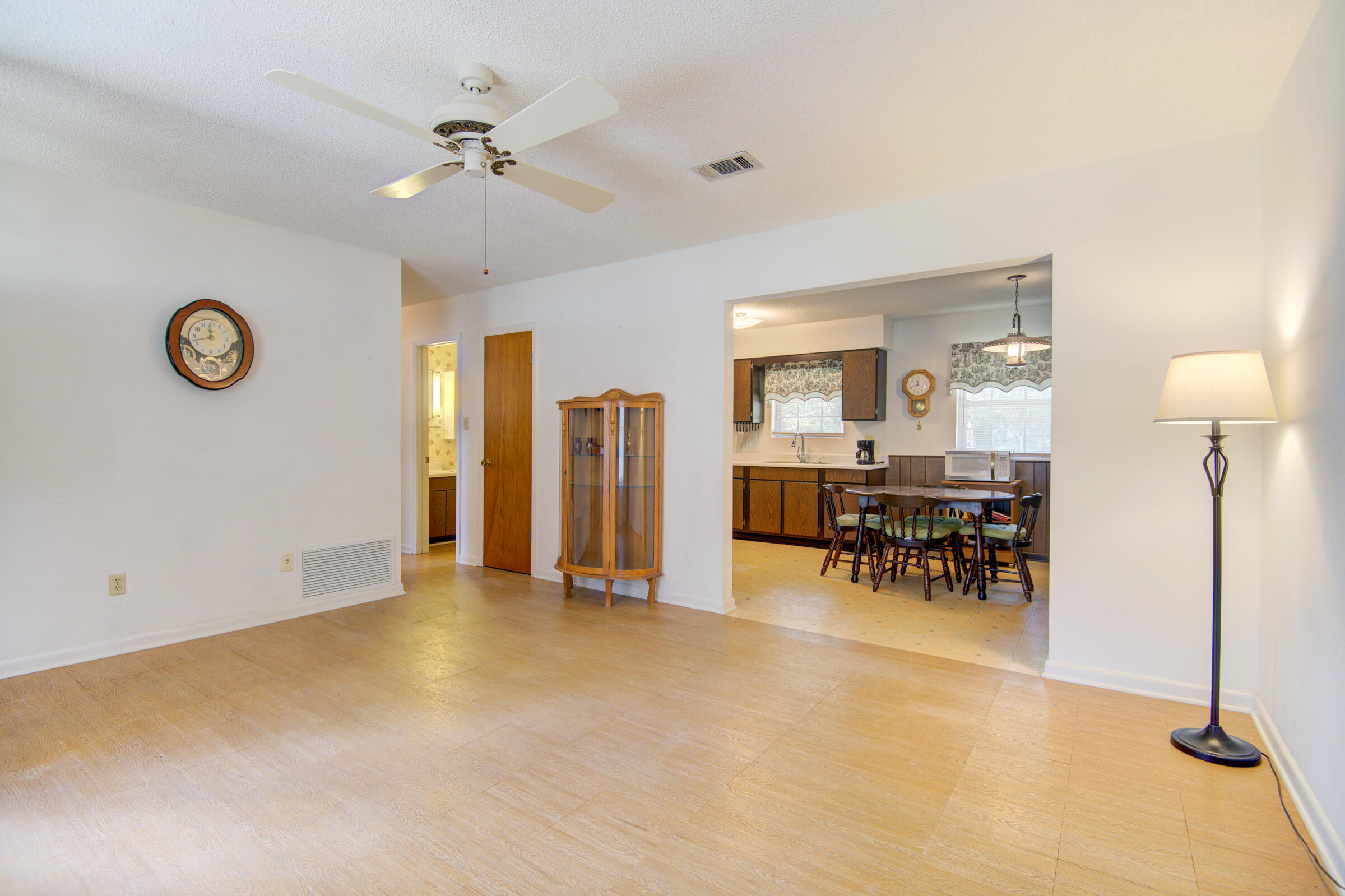 4826 Primrose Street Crestview, FL 32539 - Photo 24 of 25 a view of a livingroom with furniture and a table chair