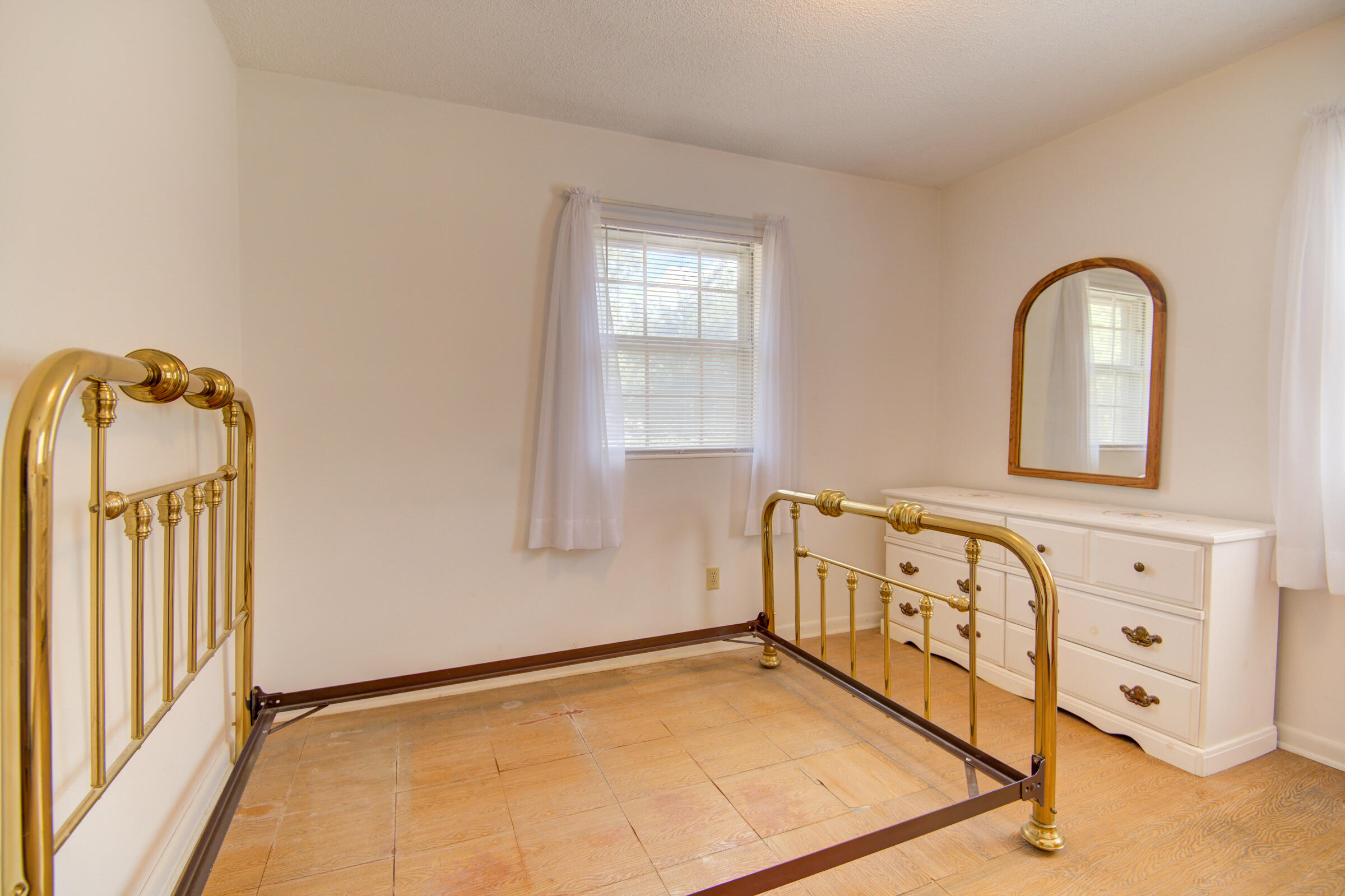 4826 Primrose Street Crestview, FL 32539 - Photo 6 of 25 a view of a livingroom with wooden floor