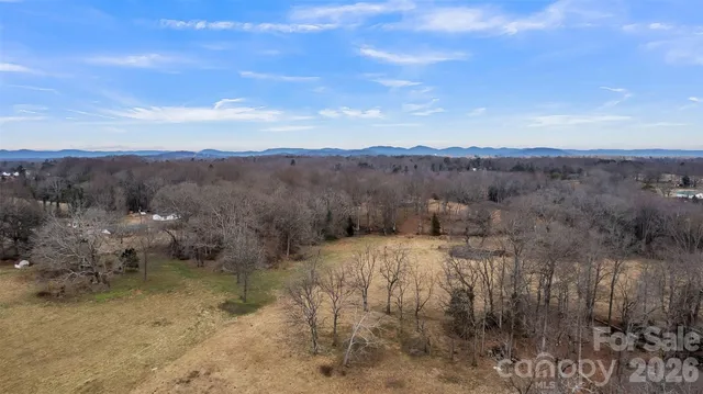 a view of a yard covered in snow