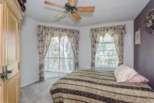 a view of livingroom with hardwood floor and ceiling fan