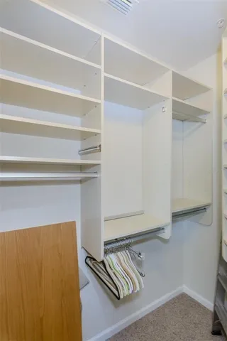 a view of a room with a fan