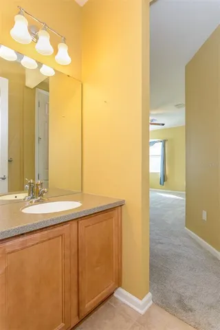 a view of a balcony with outside green space