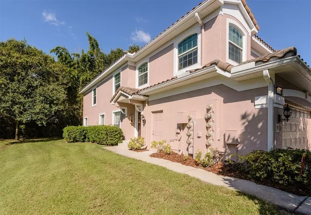 a view of a house with a yard