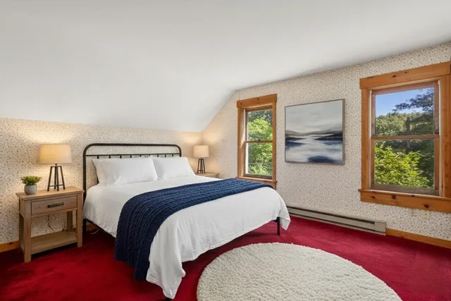 a bathroom with a shower and a sink