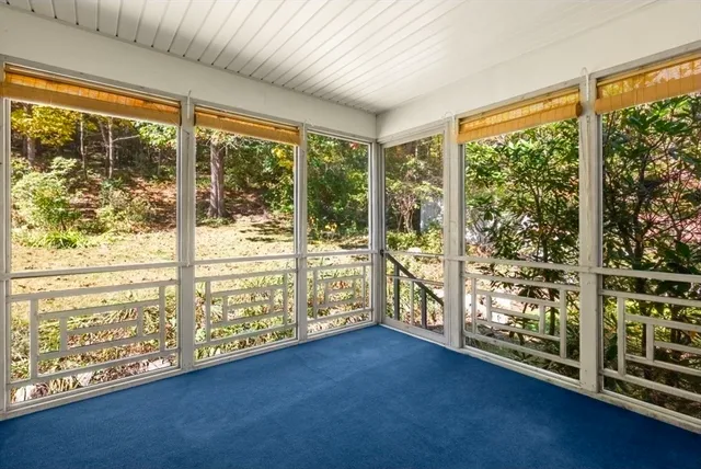 a view of empty room with a window