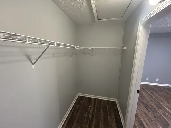 a view of a room with racks on the wall