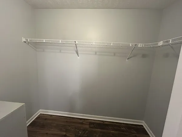 a view of small space with racks on the wall