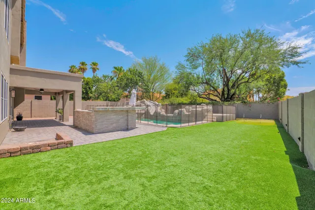 a view of a back yard of the house