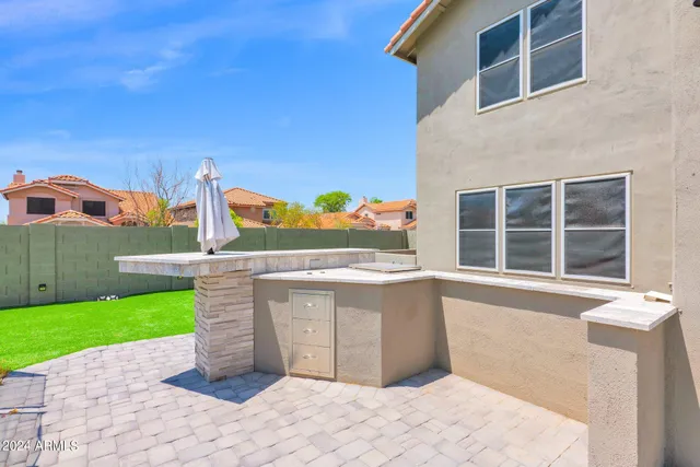a view of front door of house with outdoor space