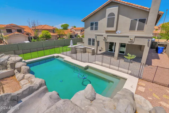a view of a two chairs in patio