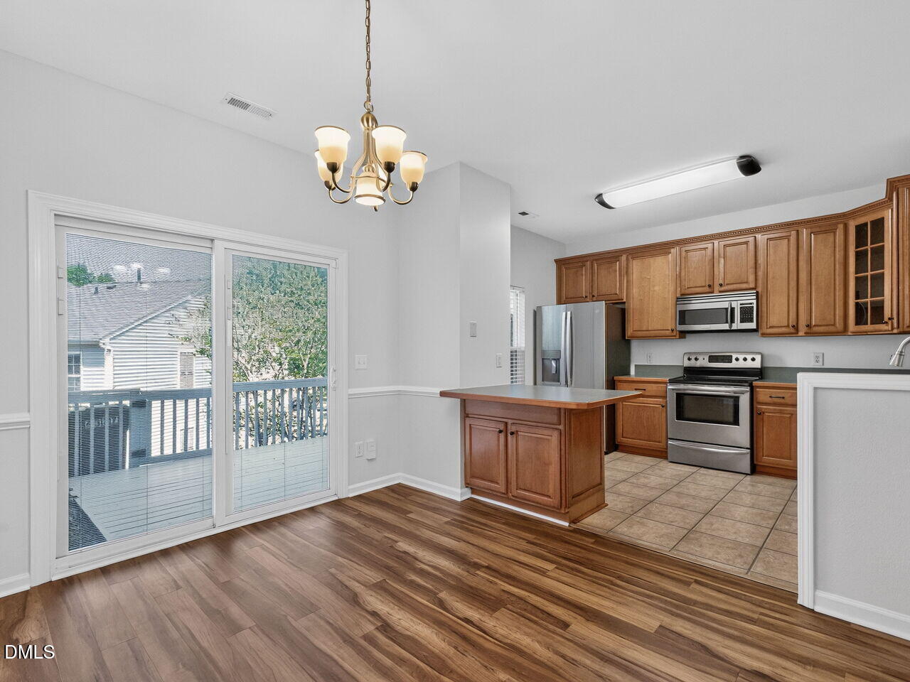 4327 Vienna Crest Drive Raleigh, NC 27613 - Photo 8 of 19 Dining Room into Kitchen