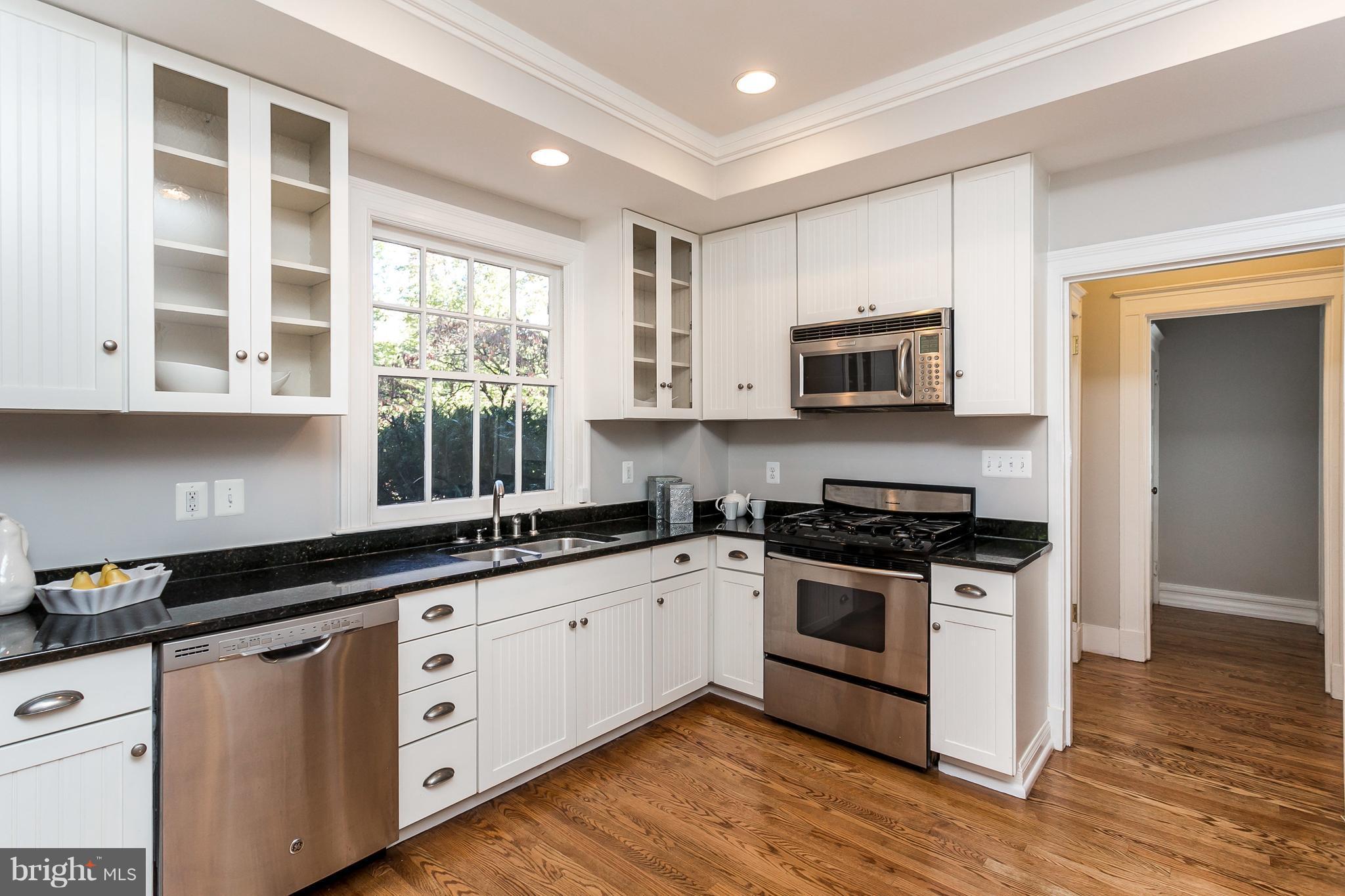 116 Woodlawn Road Baltimore, MD 21210 - Photo 14 of 30 A kitchen with granite and stainless appliances