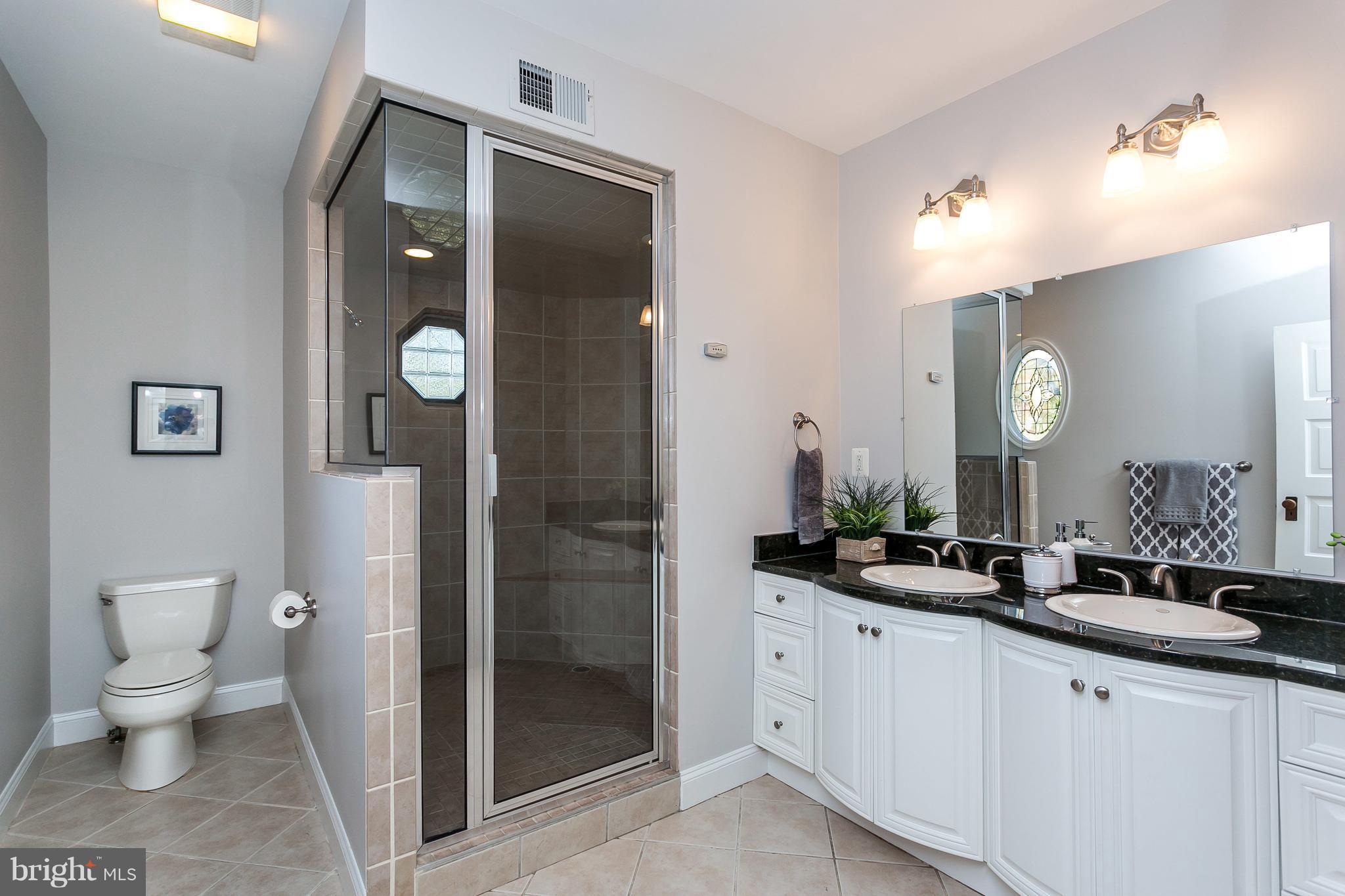 116 Woodlawn Road Baltimore, MD 21210 - Photo 22 of 30 Oversized master bath (was once a sep bedroom).