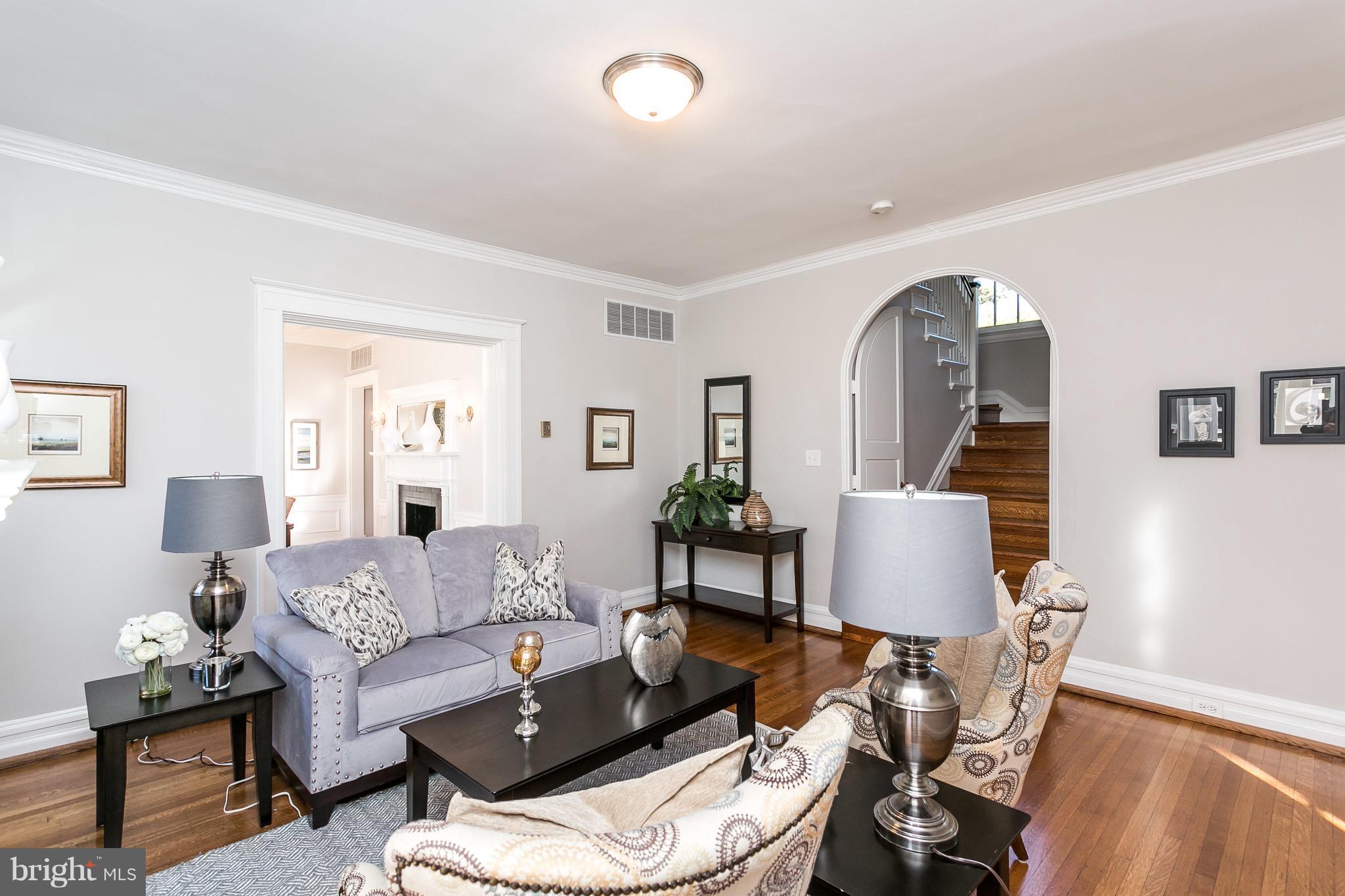 116 Woodlawn Road Baltimore, MD 21210 - Photo 4 of 30 Living room leads to dining room