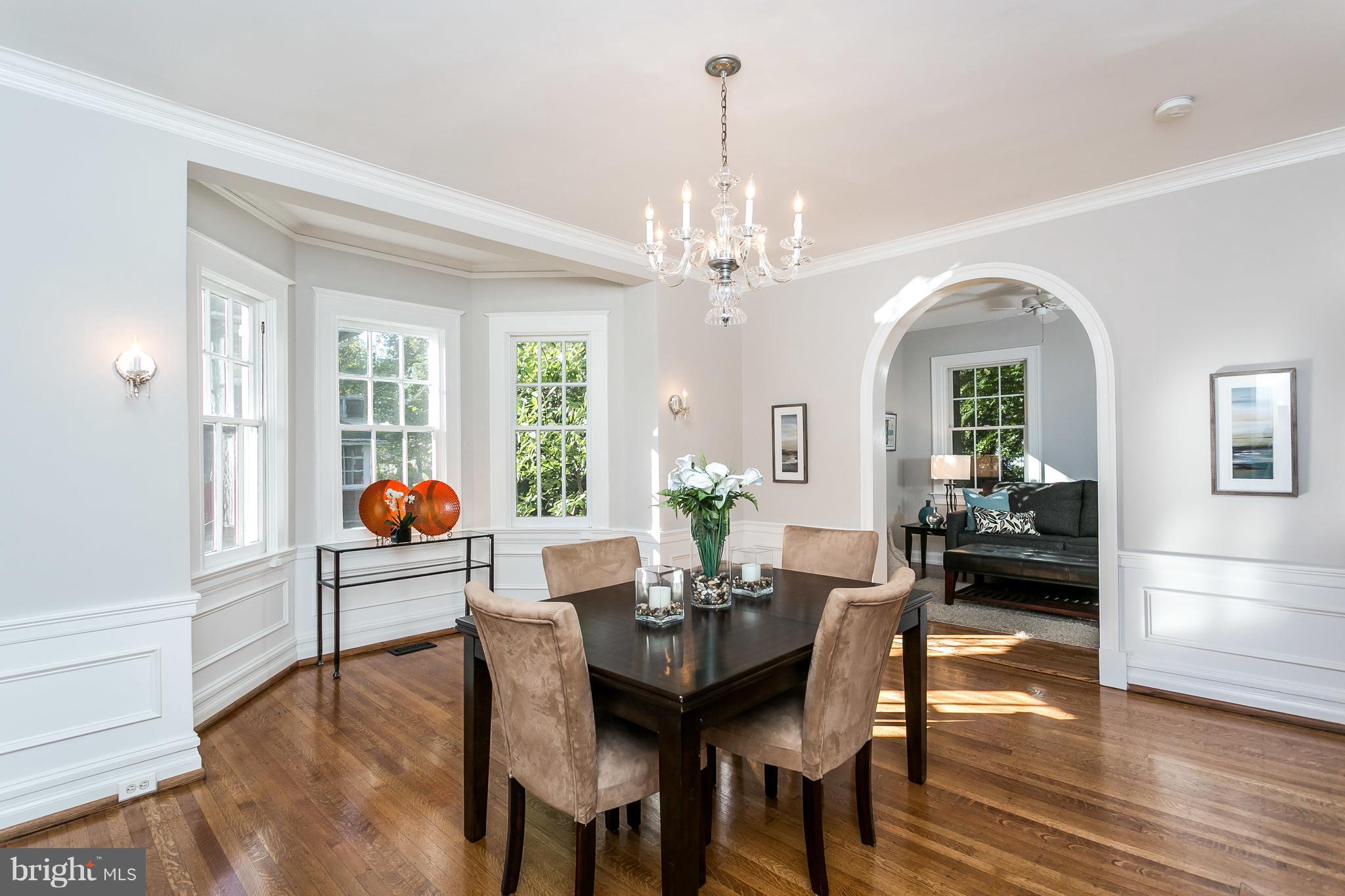 116 Woodlawn Road Baltimore, MD 21210 - Photo 6 of 30 Bright and sunny large dining room with chandelier