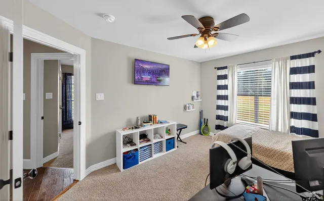 a workspace with furniture hardwood and a window