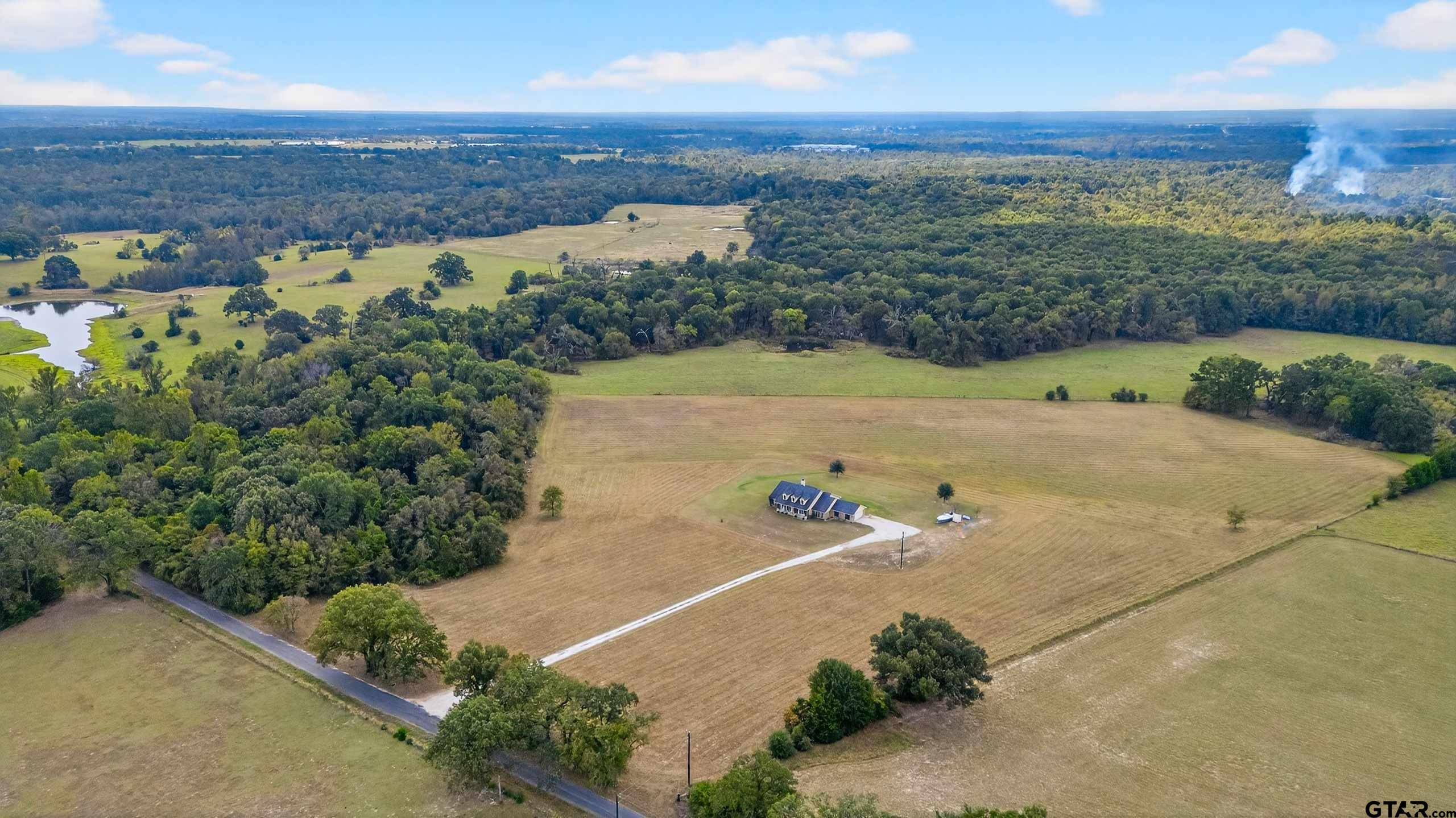 2621 Anderson County Road Palestine, TX 75803 - Photo 32 of 46 an aerial view of ocean and residential houses with outdoor space