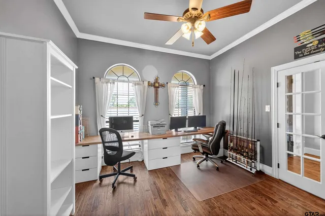 a view of a livingroom with furniture and a window
