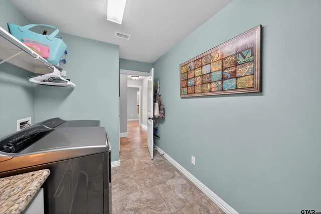 a view of a hallway with workspace