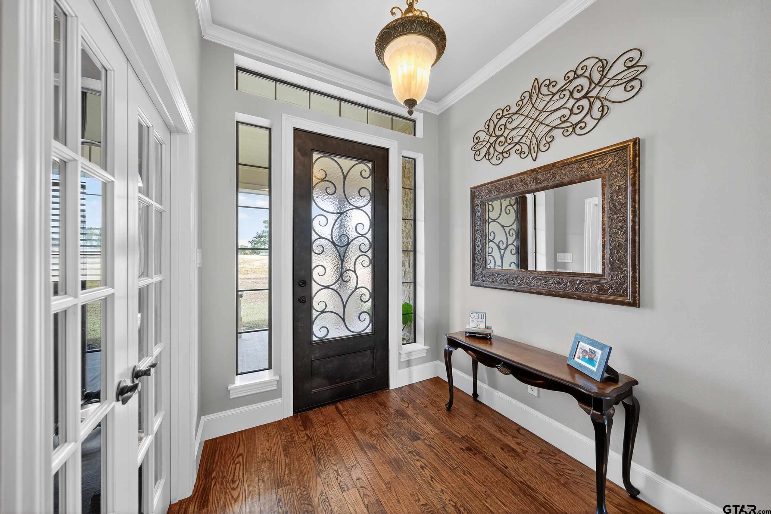 2621 Anderson County Road Palestine, TX 75803 - Photo 5 of 46 a bedroom with furniture and a window