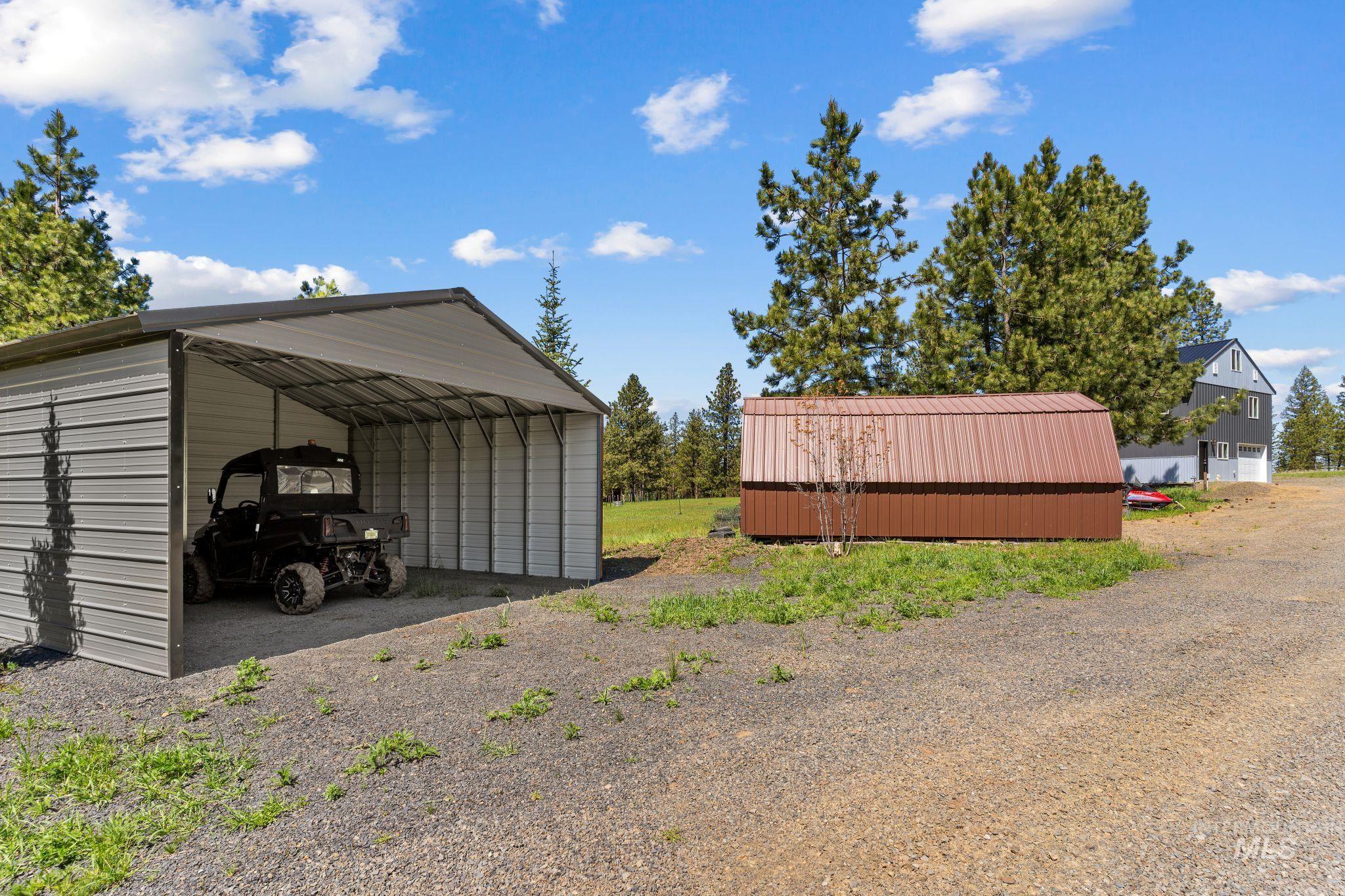 507 Bearlea Road Anatone, WA 99401 - Photo 26 of 47 Metal carport structure with a gabled roof