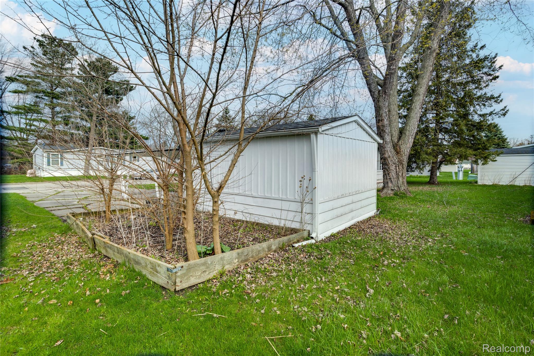 3333 Ravenswood Road Marysville, MI 48040 - Photo 23 of 25 View of shed with a garden