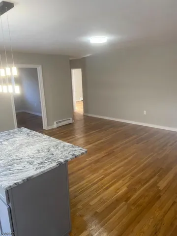 a view of a kitchen and utility room
