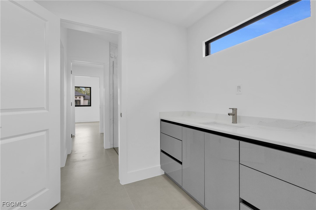 1011 State Avenue Lehigh Acres, FL 33972 - Photo 23 of 34 a view of a hallway with closet