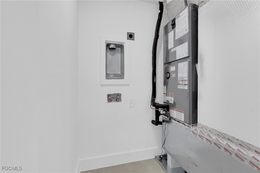 1011 State Avenue Lehigh Acres, FL 33972 - Photo 29 of 34 a view of entryway with a front door