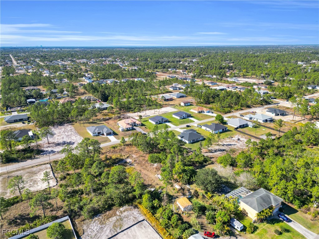 1011 State Avenue Lehigh Acres, FL 33972 - Photo 33 of 34 an aerial view of residential houses with outdoor space