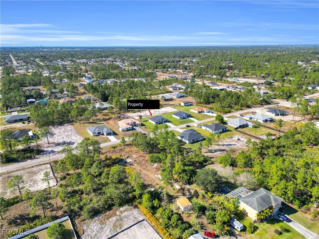 1011 State Avenue Lehigh Acres, FL 33972 - Photo 34 of 34 an aerial view of residential houses with outdoor space