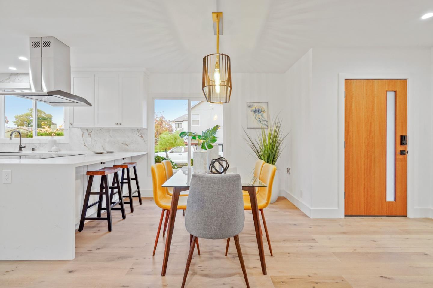 201 Channing Road Burlingame, CA 94010 - Photo 14 of 52 a view of a dining room with furniture and wooden floor