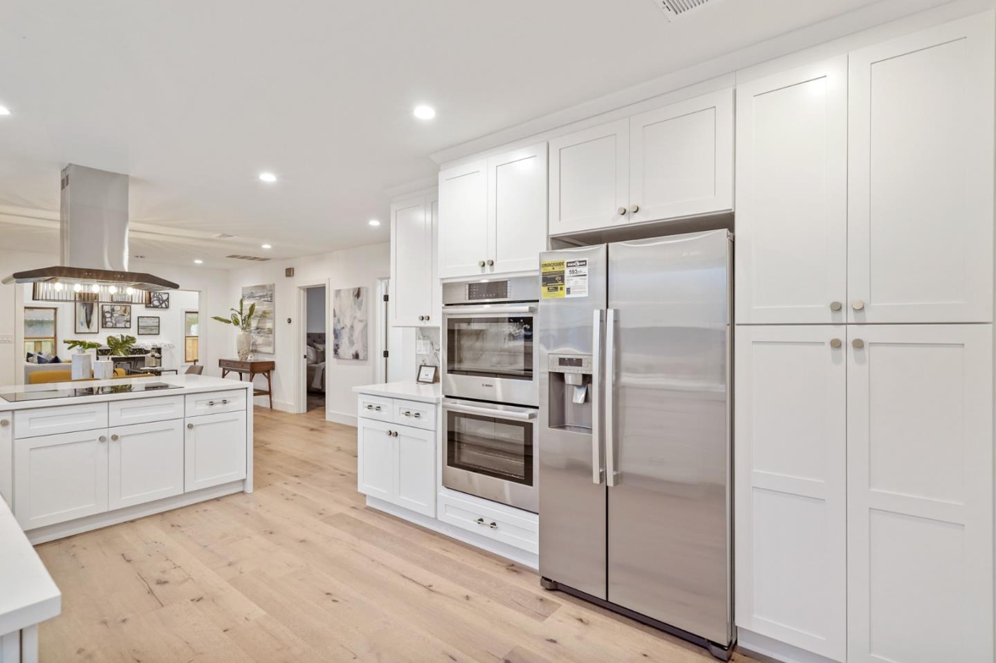 201 Channing Road Burlingame, CA 94010 - Photo 17 of 52 a kitchen with stainless steel appliances a refrigerator sink and stove