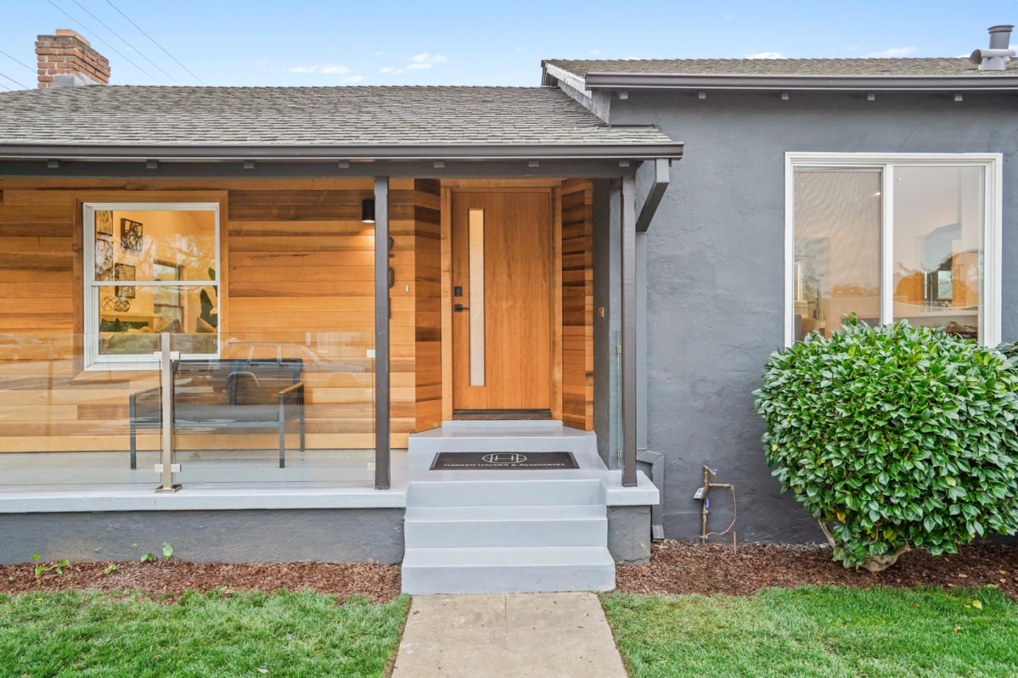 201 Channing Road Burlingame, CA 94010 - Photo 3 of 52 a front view of a house with a porch